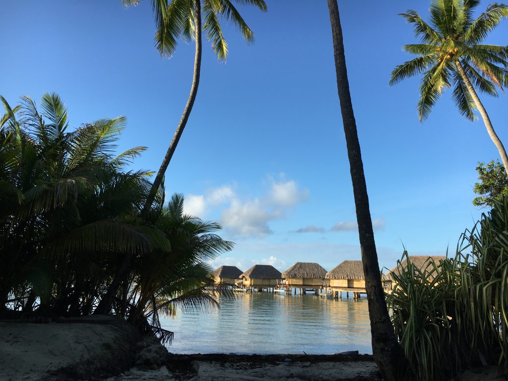 Overwater bungalows at le Taha'a island resort and spa.